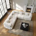 White L-shaped sectional sofa in a living room viewed from above.